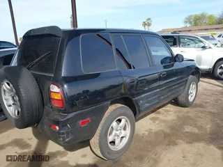 1999 Toyota RAV4 with VIN JT3HP10V8X7122921, listed as a IAAI auction lot 41851777 with 158,226 mi miles. Bid and sale history available at carsss.com. Image 4.