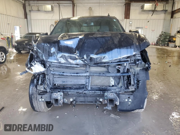 2023 Chevrolet Tahoe LT with VIN 1GNSKNKD0PR196082, listed as a Copart auction lot 45707215 with 35,736 mi miles and Salvage title. Bid and sale history available at DreamBid. Image 5.