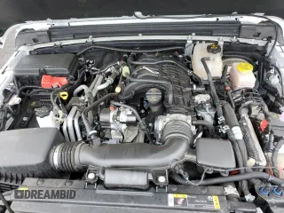 2023 Jeep Wrangler Sahara z VIN 1C4HJXEG9PW544275, wystawiony jako Copart lot #59932585 z przebiegiem 21 382 mil mil oraz Szkoda całkowita • Salvage title. Historia ofert i sprzedaży dostępna na DreamBid. Obrazek 11.