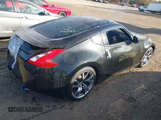 2014 Nissan 370Z with VIN JN1AZ4EH8EM636717, listed as a IAAI auction lot 40751494 with Not Provided miles and . Bid and sale history available at DreamBid. Image 4.