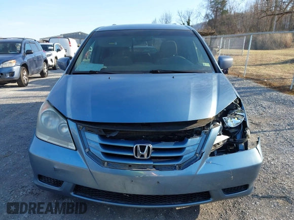 2010 Honda Odyssey EX z VIN 5FNRL3H46AB059211, wystawiony jako IAAI lot #41504573 z przebiegiem 217 415 mil mil oraz . Historia ofert i sprzedaży dostępna na DreamBid. Obrazek 13.