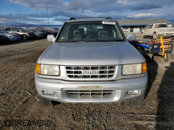 1999 Isuzu Rodeo S z VIN 4S2CM58W8X4339006, wystawiony jako Copart lot #84285294 z przebiegiem 129 191 mil mil oraz Czysty tytuł • Clean title. Historia ofert i sprzedaży dostępna na DreamBid. Obrazek 5.