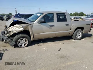 2005 Dodge Dakota SLT with VIN 1D7HW48N85S267221, listed as a Copart auction lot 66398214 with 154,545 mi miles and Salvage Title. Bid and sale history available at carsss.com. Image 1.