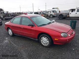 1999 Ford Taurus LX with VIN 1FAFP52U0XG194751, listed as a IAAI auction lot 41417609 with 98,820 mi miles. Bid and sale history available at carsss.com. Image 1.