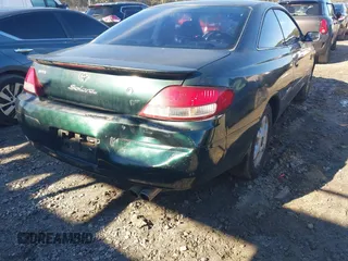 1999 Toyota Solara SE with VIN 2T1CF22P2XC152976, listed as a IAAI auction lot 41316334 with 240,623 mi miles. Bid and sale history available at carsss.com. Image 6.