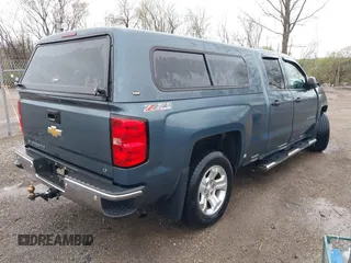 2014 Chevrolet Silverado 1500 LT with VIN 1GCVKREC8EZ179818, listed as a IAAI auction lot 41912365 with 57,167 mi miles. Bid and sale history available at carsss.com. Image 4.
