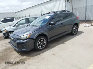 2018 Subaru Crosstrek Premium z VIN JF2GTACC9JH215303, wystawiony jako IAAI lot #42228185 z przebiegiem 71 170 mil mil oraz . Historia ofert i sprzedaży dostępna na DreamBid. Obrazek 17.