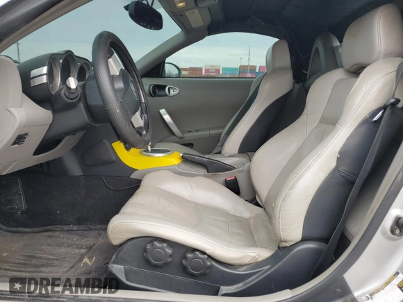 2004 Nissan 350Z Enthusiast z VIN JN1AZ36A74T013105, wystawiony jako Copart lot #82797874 z przebiegiem Nie podano mil oraz Szkoda całkowita • Salvage title. Historia ofert i sprzedaży dostępna na DreamBid. Obrazek 7.