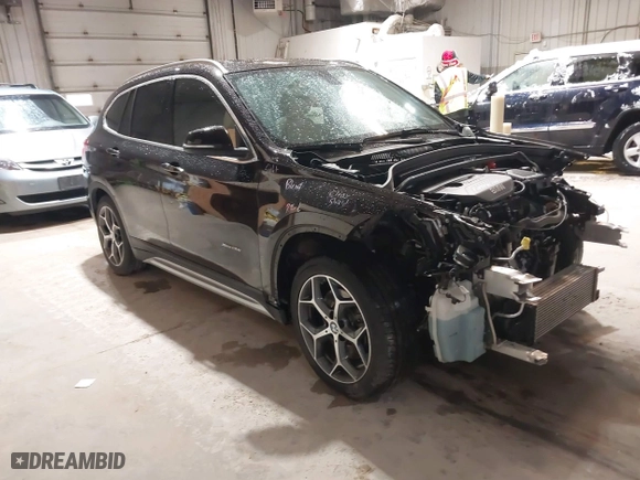 2016 BMW X1 xDrive28i with VIN WBXHT3C33GP886935, listed as a IAAI auction lot 41707367 with 73,201 mi miles. Bid and sale history available at carsss.com. Image 1.