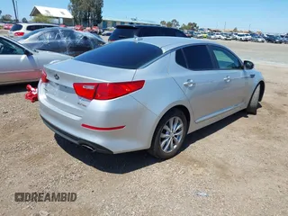 2015 Kia Optima EX with VIN 5XXGN4A73FG436223, listed as a IAAI auction lot 41970418 with 174,002 mi miles. Bid and sale history available at carsss.com. Image 4.