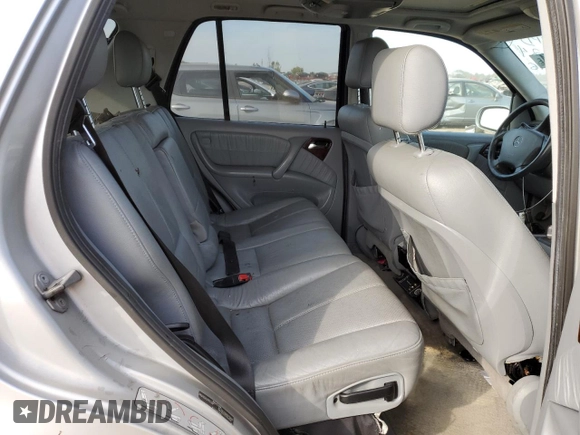 2003 Mercedes-Benz M-Class 3.7L with VIN 4JGAB57E33A421993, listed as a Copart auction lot 71800334 with 210,086 mi miles and Salvage Title. Bid and sale history available at carsss.com. Image 10.
