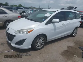 2012 Mazda 5 Sport with VIN JM1CW2BLXC0114770, listed as a IAAI auction lot 42147656 with 99,908 mi miles and . Bid and sale history available at DreamBid. Image 2.
