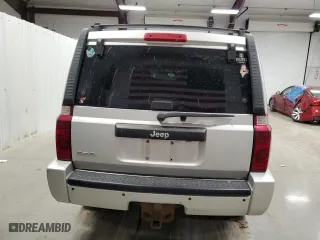 2010 Jeep Commander Sport with VIN 1J4RG4GK2AC127697, listed as a Copart auction lot 87582415 with 204,676 mi miles and Salvage Title. Bid and sale history available at carsss.com. Image 6.