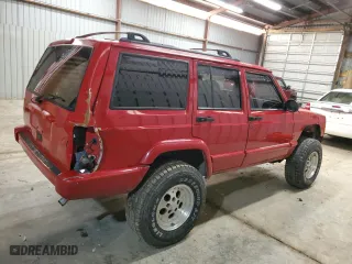 1999 Jeep Cherokee Sport with VIN 1J4FF68S4XL661115, listed as a Copart auction lot 47522675 with 200,630 mi miles and Salvage Title. Bid and sale history available at carsss.com. Image 3.