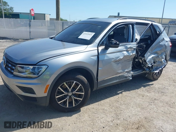 2020 Volkswagen Tiguan SE with VIN 3VV3B7AX8LM077472, listed as a IAAI auction lot 41933521 with 52,028 mi miles and . Bid and sale history available at DreamBid. Image 17.