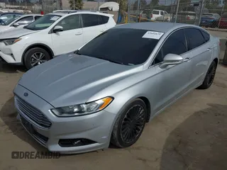 2016 Ford Fusion Titanium z VIN 3FA6P0K92GR135076, wystawiony jako IAAI lot #42604875 z przebiegiem 192 785 mil mil oraz . Historia ofert i sprzedaży dostępna na DreamBid. Obrazek 18.