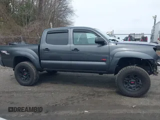 2011 Toyota Tacoma with VIN 3TMLU4EN1BM067901, listed as a IAAI auction lot 42043408 with 186,499 mi miles and . Bid and sale history available at carsss.com. Image 13.