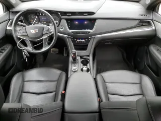 2021 Cadillac XT5 AWD Sport with VIN 1GYKNGRS2MZ142286, listed as a Copart auction lot 60699515 with 17,406 mi miles and Salvage title. Bid and sale history available at DreamBid. Image 8.