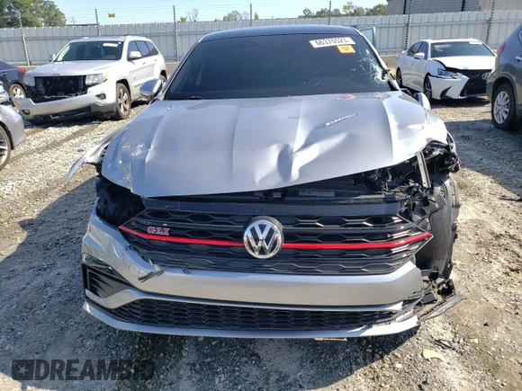 2020 Volkswagen Jetta GLI S z VIN 3VW5T7BUXLM010832, wystawiony jako Copart lot #66376523 z przebiegiem 66 434 mil mil oraz . Historia ofert i sprzedaży dostępna na DreamBid. Obrazek 5.