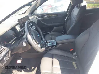 2024 BMW X4 xDrive30i with VIN 5UX33DT02R9W73855, listed as a IAAI auction lot 42712082 with 30,654 mi miles and . Bid and sale history available at DreamBid. Image 5.