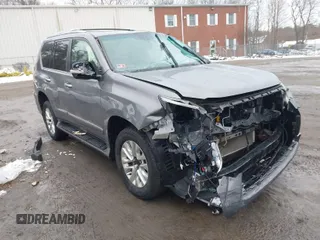 2014 Lexus GX 460 with VIN JTJBM7FX5E5089971, listed as a IAAI auction lot 41566494 with 136,778 mi miles. Bid and sale history available at carsss.com. Image 1.
