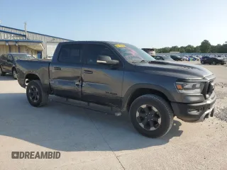 2020 Ram 1500 Rebel with VIN 1C6SRFLT4LN144723, listed as a Copart auction lot 59843935 with 90,936 mi miles and Salvage title. Bid and sale history available at DreamBid. Image 4.