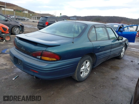 1996 Pontiac Bonneville z VIN 1G2HZ5210TH210829, wystawiony jako IAAI lot #41203888 z przebiegiem 154 990 mil mil oraz . Historia ofert i sprzedaży dostępna na DreamBid. Obrazek 4.