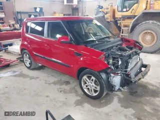 2011 Kia Soul + with VIN KNDJT2A23B7329051, listed as a IAAI auction lot 41963566 with 146,063 mi miles. Bid and sale history available at carsss.com. Image 1.