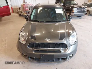2011 MINI Countryman S z VIN WMWZC3C54BWL78942, wystawiony jako IAAI lot #42345296 z przebiegiem 158 202 mil mil oraz . Historia ofert i sprzedaży dostępna na DreamBid. Obrazek 6.