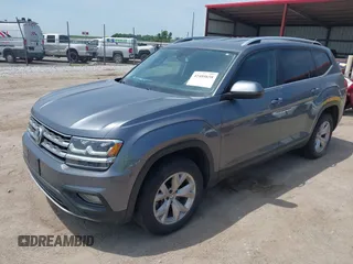 2018 Volkswagen Atlas SE with VIN 1V2KR2CA2JC585922, listed as a IAAI auction lot 42488658 with 105,878 mi miles and . Bid and sale history available at DreamBid. Image 17.