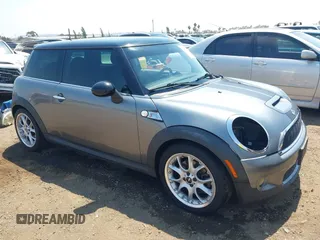 2010 MINI Hardtop S with VIN WMWMF7C53ATZ70244, listed as a IAAI auction lot 42673174 with 137,805 mi miles and . Bid and sale history available at DreamBid. Image 1.