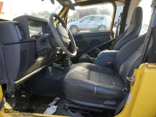 2001 Jeep Wrangler Sport with VIN 1J4FA49S21P312522, listed as a Copart auction lot 54698935 with 201,199 mi miles and Salvage Title. Bid and sale history available at carsss.com. Image 7.