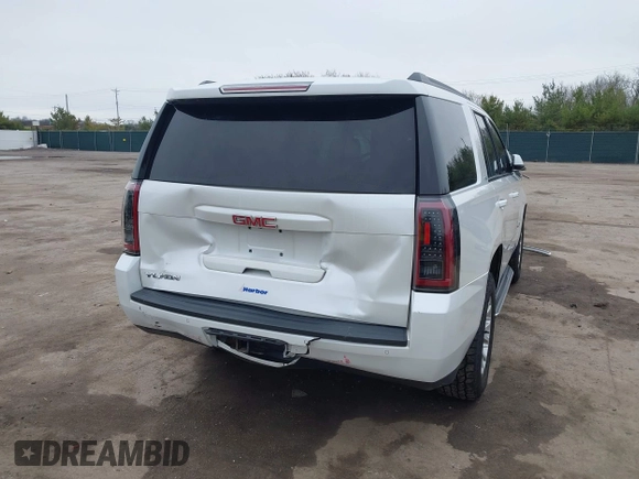 2016 GMC Yukon SLT with VIN 1GKS2BKC5GR374815, listed as a IAAI auction lot 41889495 with 163,464 mi miles. Bid and sale history available at carsss.com. Image 6.