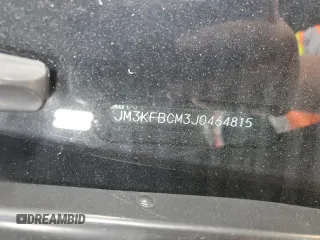2018 Mazda CX-5 Touring z VIN JM3KFBCM3J0464815, wystawiony jako Copart lot #58794685 z przebiegiem Nie podano mil oraz Szkoda całkowita • Salvage title. Historia ofert i sprzedaży dostępna na DreamBid. Obrazek 13.
