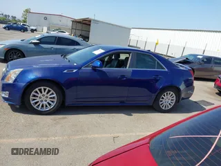 2012 Cadillac CTS Luxury with VIN 1G6DE5E59C0102621, listed as a IAAI auction lot 42554121 with 128,430 mi miles and . Bid and sale history available at DreamBid. Image 14.