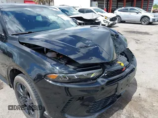 2024 Dodge Hornet R/T with VIN ZACPDFCW9R3A16217, listed as a IAAI auction lot 42589754 with 14,484 mi miles and . Bid and sale history available at DreamBid. Image 19.