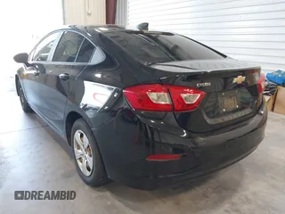 2017 Chevrolet Cruze LS z VIN 1G1BC5SM4H7270275, wystawiony jako IAAI lot #42484111 z przebiegiem 90 589 mil mil oraz . Historia ofert i sprzedaży dostępna na DreamBid. Obrazek 3.