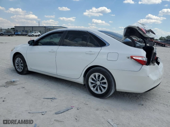 2015 Toyota Camry XLE with VIN 4T1BF1FK5FU989559, listed as a Copart auction lot 50803795 with 211,797 mi miles and Salvage Title. Bid and sale history available at carsss.com. Image 2.