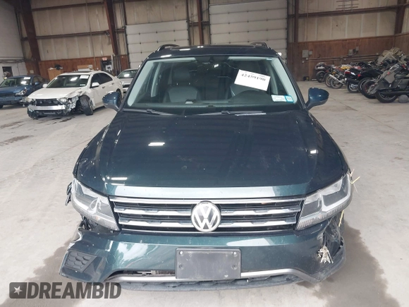 2018 Volkswagen Tiguan SEL with VIN 3VV2B7AX3JM133326, listed as a IAAI auction lot 42459190 with 94,665 mi miles and . Bid and sale history available at DreamBid. Image 12.