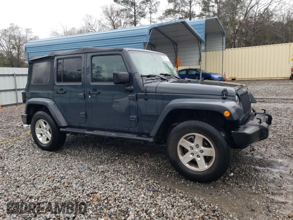 2016 Jeep Wrangler Unlimited Sport with VIN 1C4BJWDG2GL305086, listed as a Copart auction lot 48212105 with 113,001 mi miles and Salvage Title. Bid and sale history available at DreamBid. Image 4.