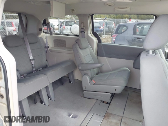 2010 Dodge Grand Caravan SXT with VIN 2D4RN5D18AR218903, listed as a IAAI auction lot 41560484 with Not Provided miles and . Bid and sale history available at DreamBid. Image 8.