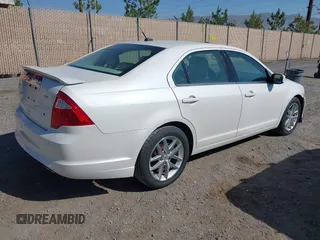 2012 Ford Fusion SEL z VIN 3FAHP0JA0CR365844, wystawiony jako IAAI lot #42306276 z przebiegiem 120 819 mil mil oraz . Historia ofert i sprzedaży dostępna na DreamBid. Obrazek 4.