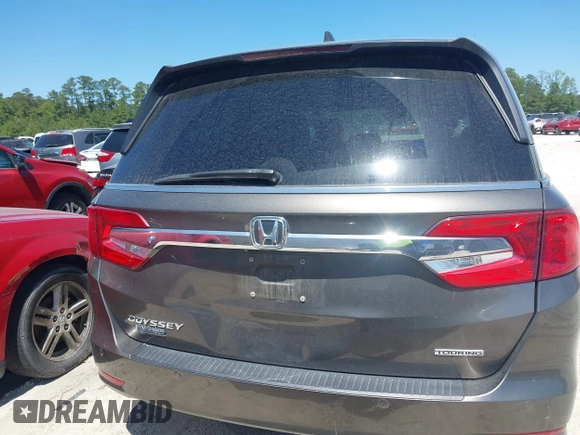 2020 Honda Odyssey Touring with VIN 5FNRL6H87LB002202, listed as a IAAI auction lot 42015741 with 182,051 mi miles and . Bid and sale history available at DreamBid. Image 16.