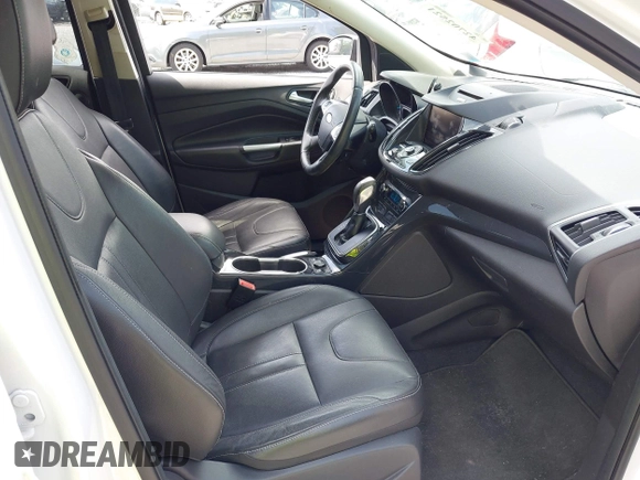 2013 Ford Escape Titanium z VIN 1FMCU9J9XDUA10838, wystawiony jako IAAI lot #42702521 z przebiegiem 86 815 mil mil oraz . Historia ofert i sprzedaży dostępna na DreamBid. Obrazek 5.