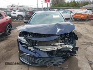 2021 Toyota Camry Hybrid LE with VIN 4T1C31AKXMU565585, listed as a IAAI auction lot 41057955 with 31,976 mi miles. Bid and sale history available at carsss.com. Image 13.