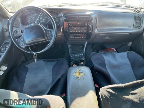1999 Ford Explorer XLT with VIN 1FMZU32P6XZB94980, listed as a Copart auction lot 66349164 with 290,386 mi miles and Clean title. Bid and sale history available at DreamBid. Image 7.