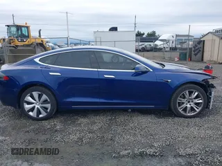2017 Tesla Model S 100D with VIN 5YJSA1E25HF184502, listed as a IAAI auction lot 41834310 with 92,887 mi miles and . Bid and sale history available at DreamBid. Image 14.
