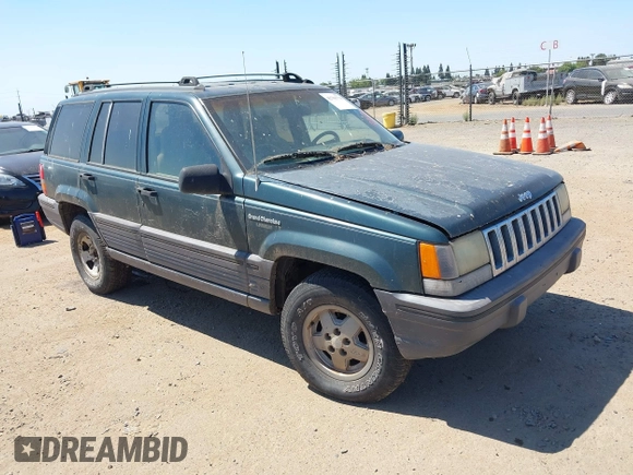 1994 Jeep Grand Cherokee Laredo with VIN 1J4GZ58S2RC118502, listed as a IAAI auction lot 42701778 with 420,559 mi miles and . Bid and sale history available at DreamBid. Image 1.
