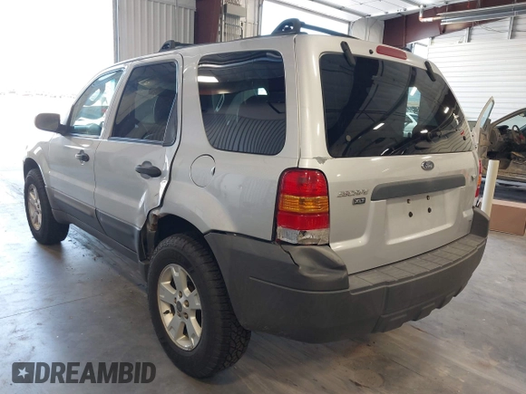 2006 Ford Escape XLT with VIN 1FMCU93126KC12711, listed as a IAAI auction lot 42659618 with 180,611 mi miles and . Bid and sale history available at DreamBid. Image 3.