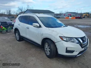 2017 Nissan Rogue S with VIN JN8AT2MVXHW017964, listed as a IAAI auction lot 41869965 with 123,544 mi miles. Bid and sale history available at carsss.com. Image 1.